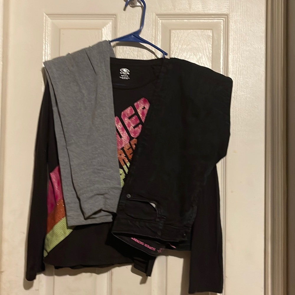 Lot of 3. 1 long sleeved shirt and 2 pairs of pants.  Size 14.